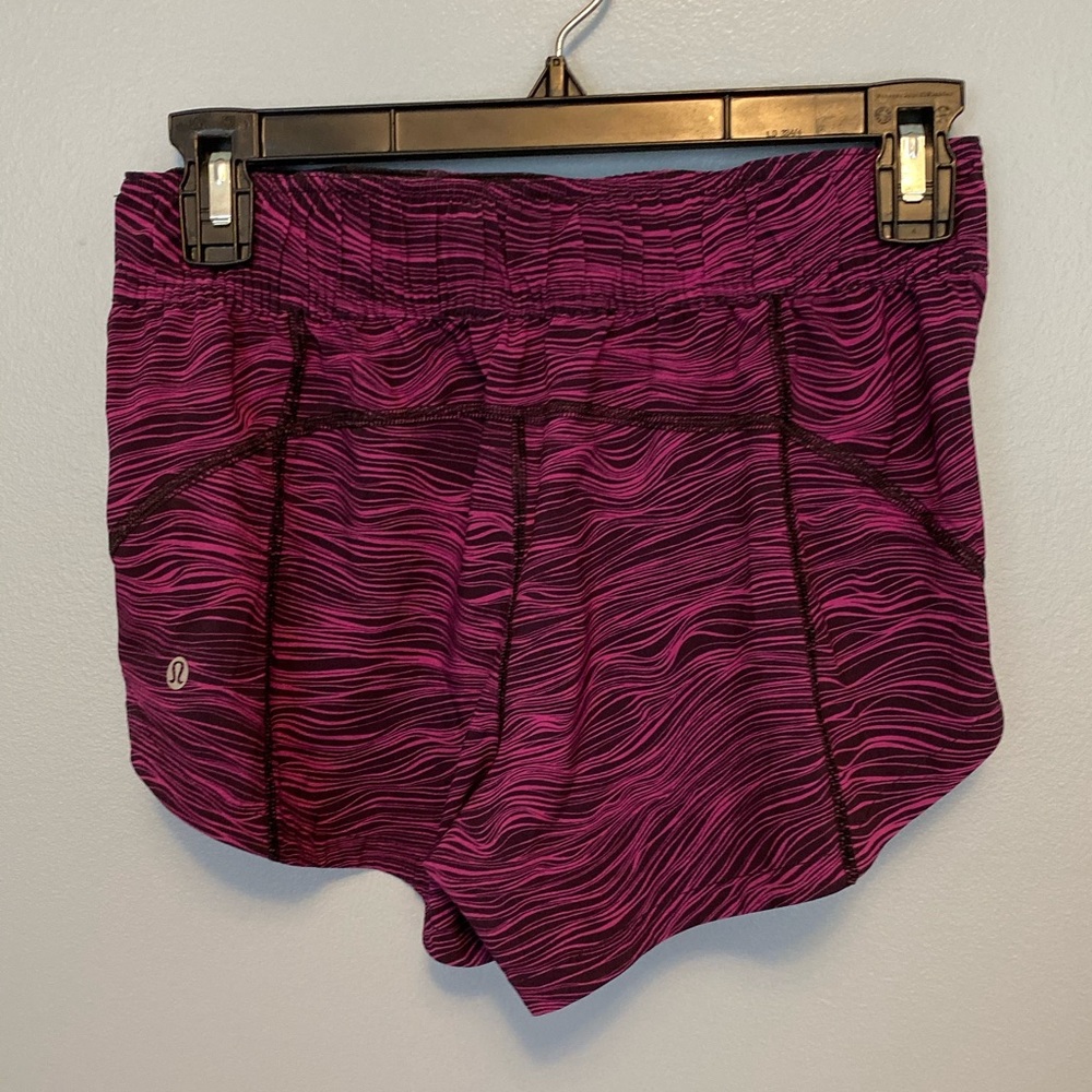 Lululemon size 4 reversible running shorts.